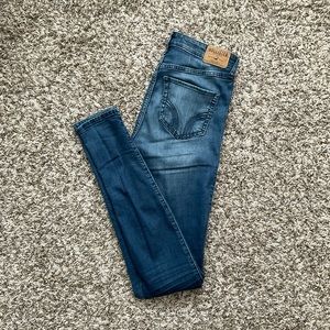 Hollister dark wash split knee ripped jeans